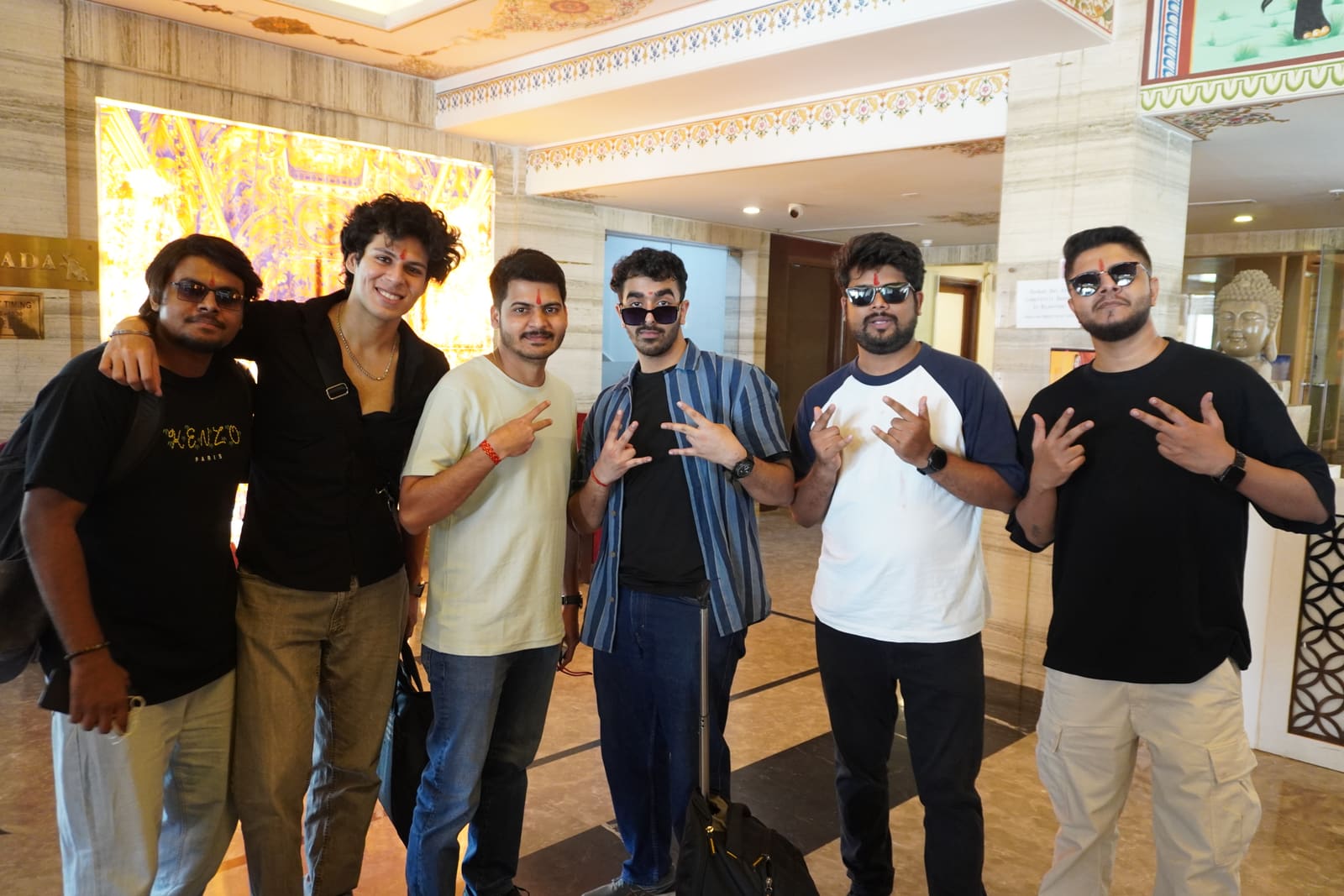 A group of Infollion colleagues posing together during an offsite trip.